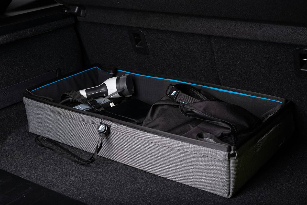 Hard travel armor bag undergoing stress test on airport conveyor belt