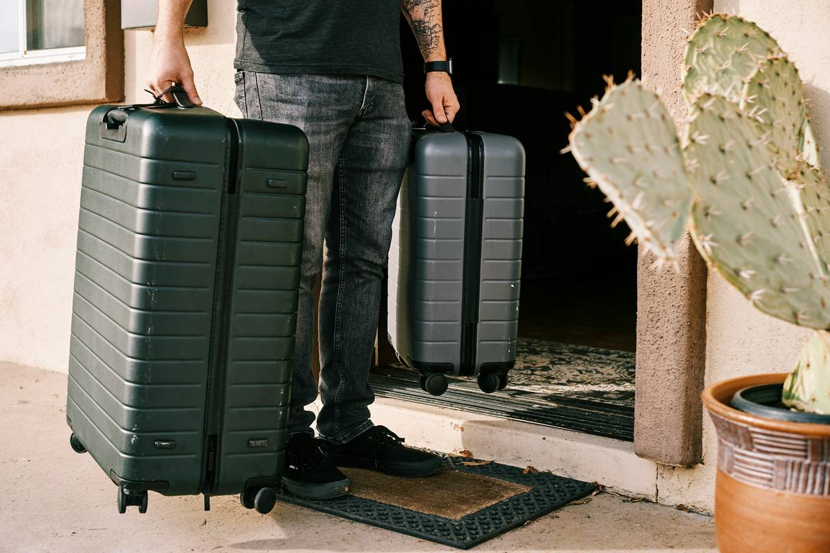 Close-up of durable suitcase with reinforced corners and smooth-rolling wheels